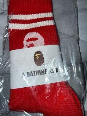 A Bathing Ape  Striped Crew Socks pink, blue, white, and red.